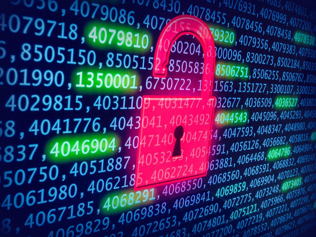 Keyboard and warning graphic representing a data security breach under POPIA